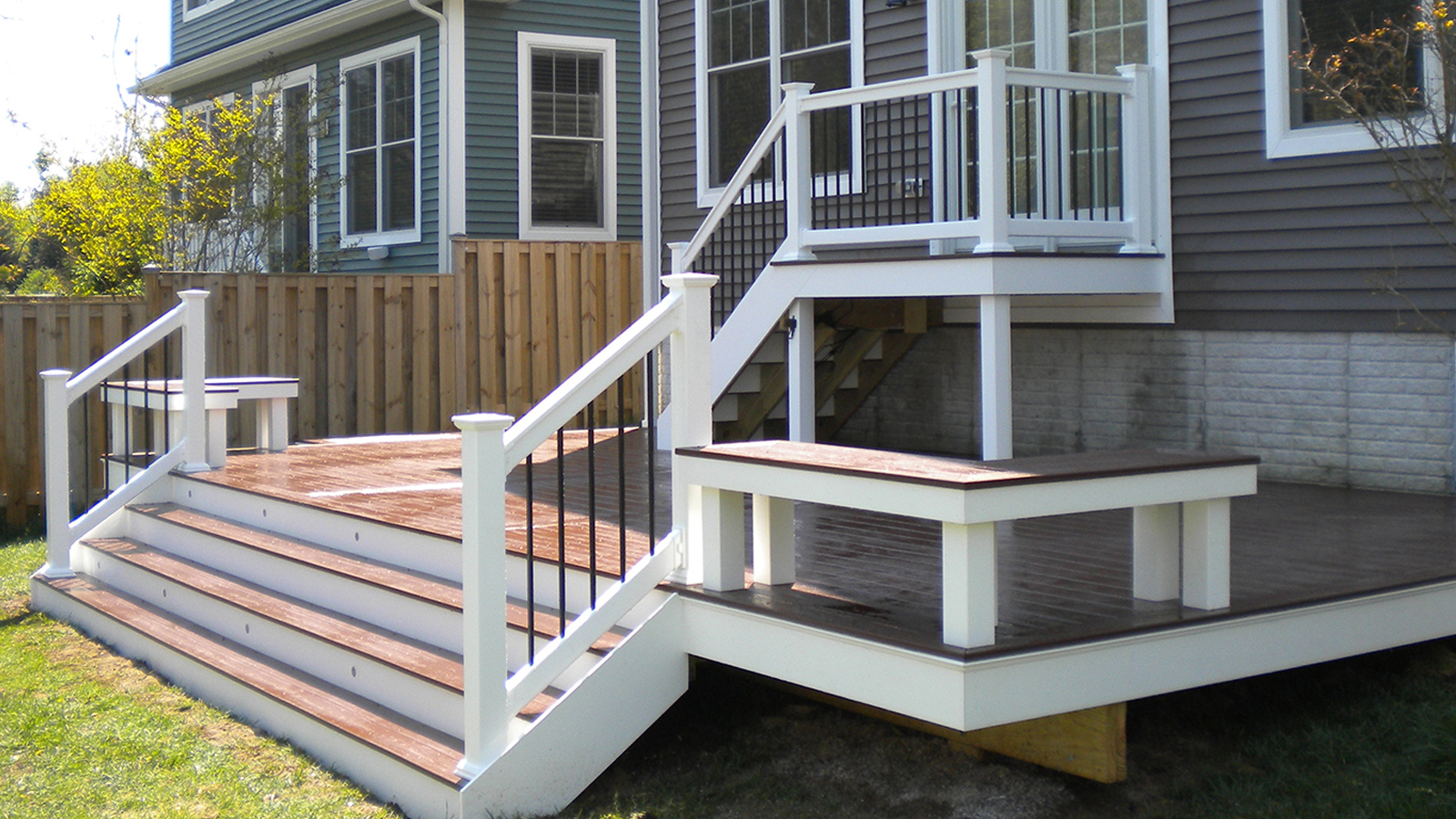 Homepage Image Featuring Rear Deck with Stairs to Backyard