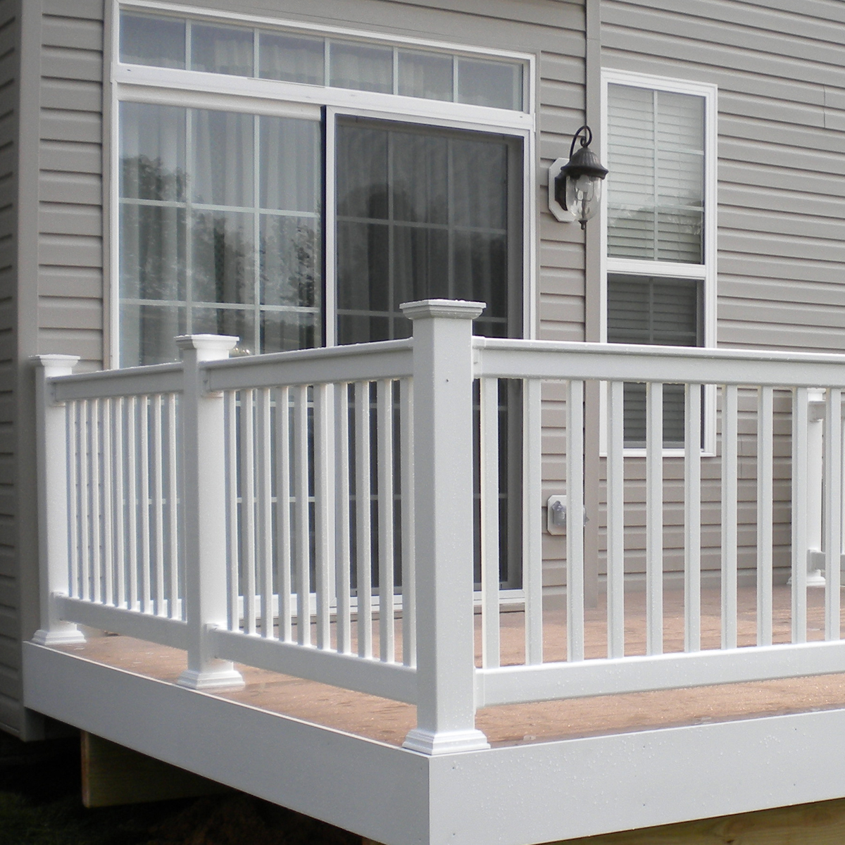 Tight shot of railing on a deck.